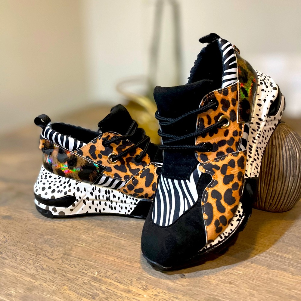 Brand new Steve Madden animal print sneakers